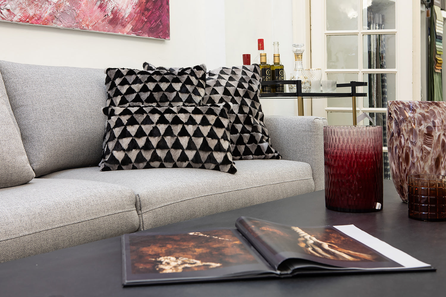 COJÍN VISÓN TRIÁNGULOS