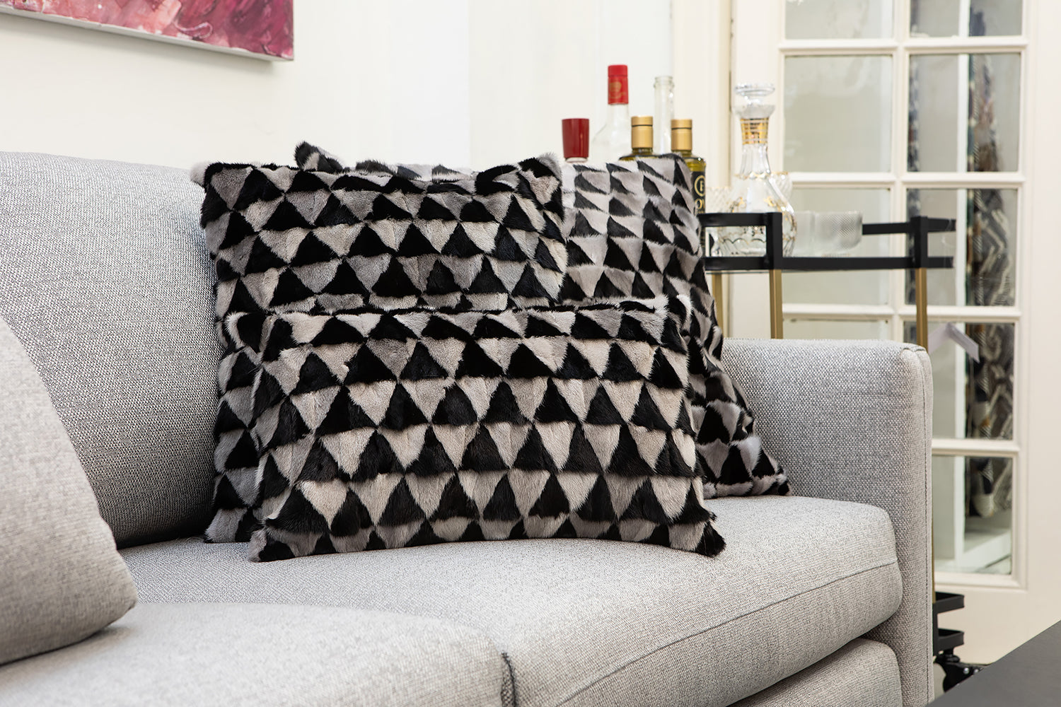 COJÍN VISÓN TRIÁNGULOS